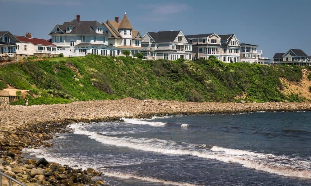 Coastal homes overlooking the ocean showing flood risk areas where an elevation certificate may be required for mortgage closings
