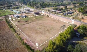 Aerial view of a property in York, Maine with visible boundary survey markings, including dashed lines and pinpoints defining the land's perimeter.