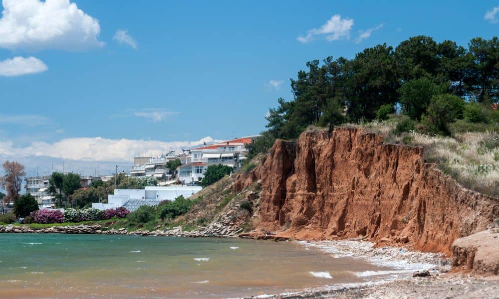 A steep eroded coastline showing how shifting land can affect the accuracy of a topographic survey