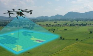 Digital land mapping drone overlay - ALTA SURVEY Maine A drone survey capturing a large landscape with a digital mapping grid projected below