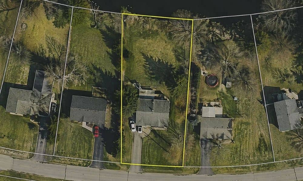 Aerial view of residential property showing lot lines and layout, helping a local surveyor understand boundary details