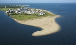 Aerial view of a coastal property illustrating the setting where an elevation certificate may be used